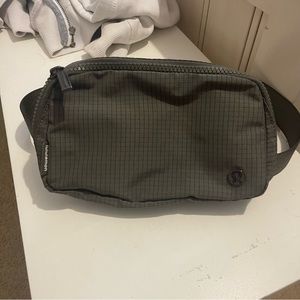 Carob Brown (more like green) grid belt bag